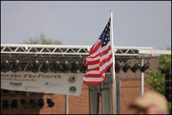 The flag at Franklin on the Fourth event in downtown Franklin, the event offers a fireworks show, live bands, games, vendors and more!