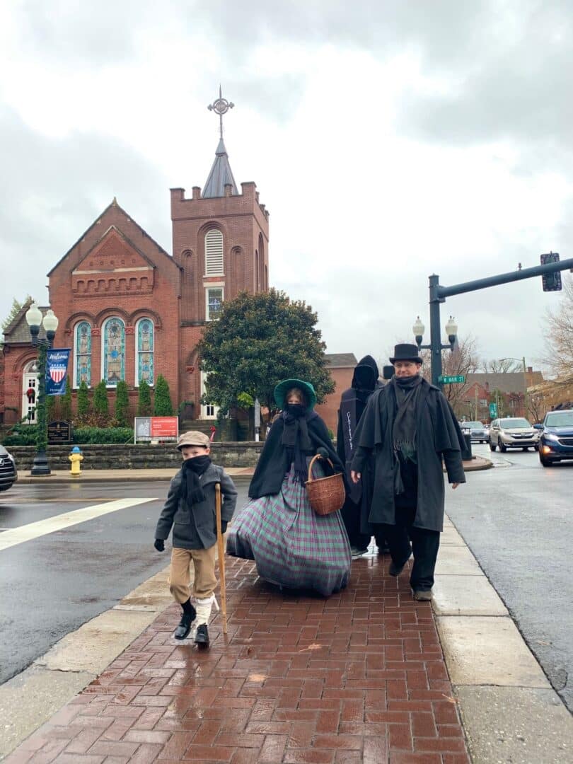 Dickens characters in downtown Franklin at the Dickens of a Christmas festival.