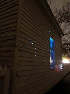 Carter House farm house exterior with bullet holes shining through, the Illumination ceremony in downtown Franklin, Tennessee, Battle of Franklin Trust will continue the tradition and display luminaries at the Carter House and Carnton at dusk to honor the casualties inflicted during the Battle of Franklin 157 years ago..
