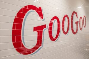 Goo Goo Chocolate Co tile wall logo, the downtown Nashville location offers Design Your Own Confection Stations, a new Chocolate Bar menu including boozy milkshakes, interactive classes, and more!