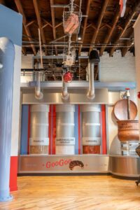 Goo Goo Chocolate Co Nashville Store Interior, downtown Nashville, TN location offers Design Your Own Confection Stations, a new Chocolate Bar menu including boozy milkshakes, interactive classes, and more!