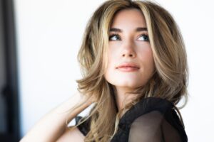 Woman posing, TRACE Salon + Supply Franklin, Cool Springs and Nashville, TN locations.