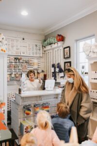 Shopping in Downtown Franklin, TN at the Purple Butterfly, shop apparel, gifts, shoes, toys, bows, and more.