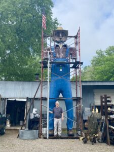 Artist Kris Nethercutt sculpted Rusty Mechanism,” the 20-foot-tall, metal man in downtown Franklin outside of The Factory at Franklin, an industrial complex that’s been transformed into a shopping and dining destination.