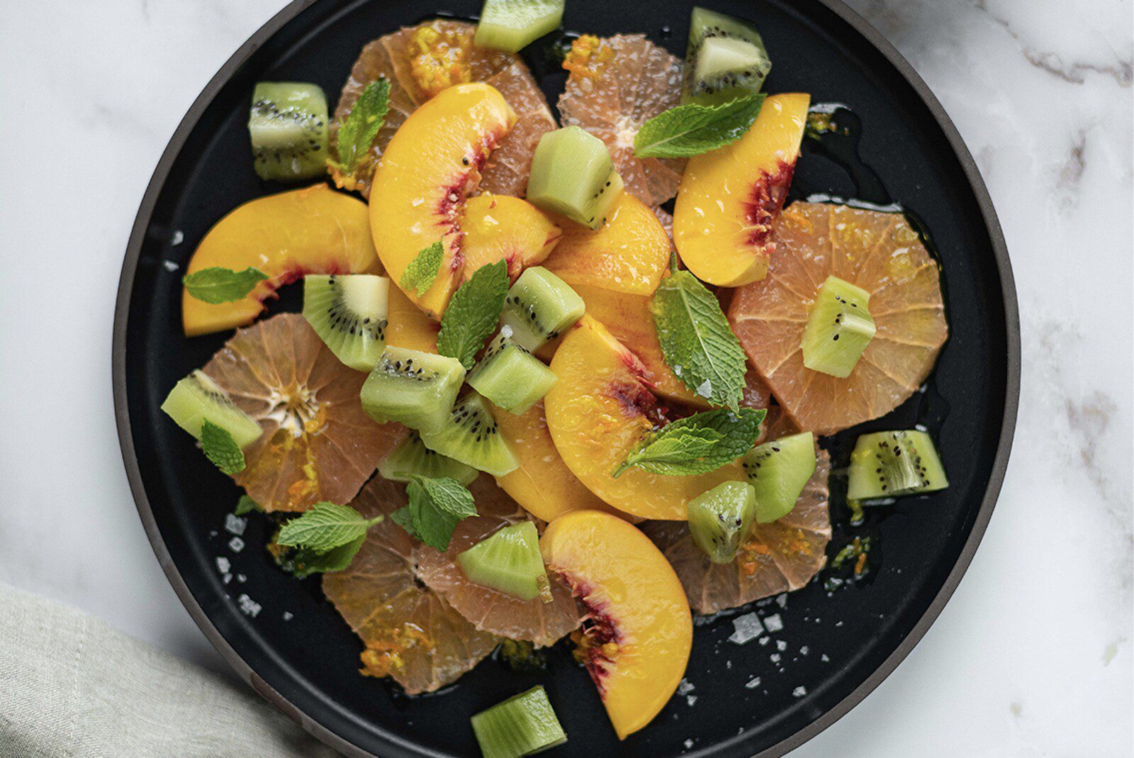 PEACH, GRAPEFRUIT, AND KIWI SALAD WITH GINGER TURMERIC DRESSING