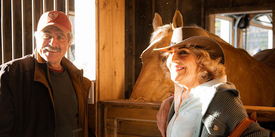 Two people smiling at Ranch Round at Trace View Ranch in Franklin, TN, a night of country music and fun at Trace View Ranch! Experience an authentic Nashville style writers round with performances by Wil Nance, Josiah Siska, Andrew Bloom, Tiera Kennedy, Charly Reynolds, and Nicole Croteau.