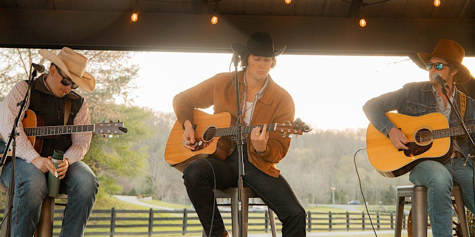 Musician performing at Ranch Round at Trace View Ranch in Franklin, TN, a night of country music and fun at Trace View Ranch! Experience an authentic Nashville style writers round with performances by Wil Nance, Josiah Siska, Andrew Bloom, Tiera Kennedy, Charly Reynolds, and Nicole Croteau.