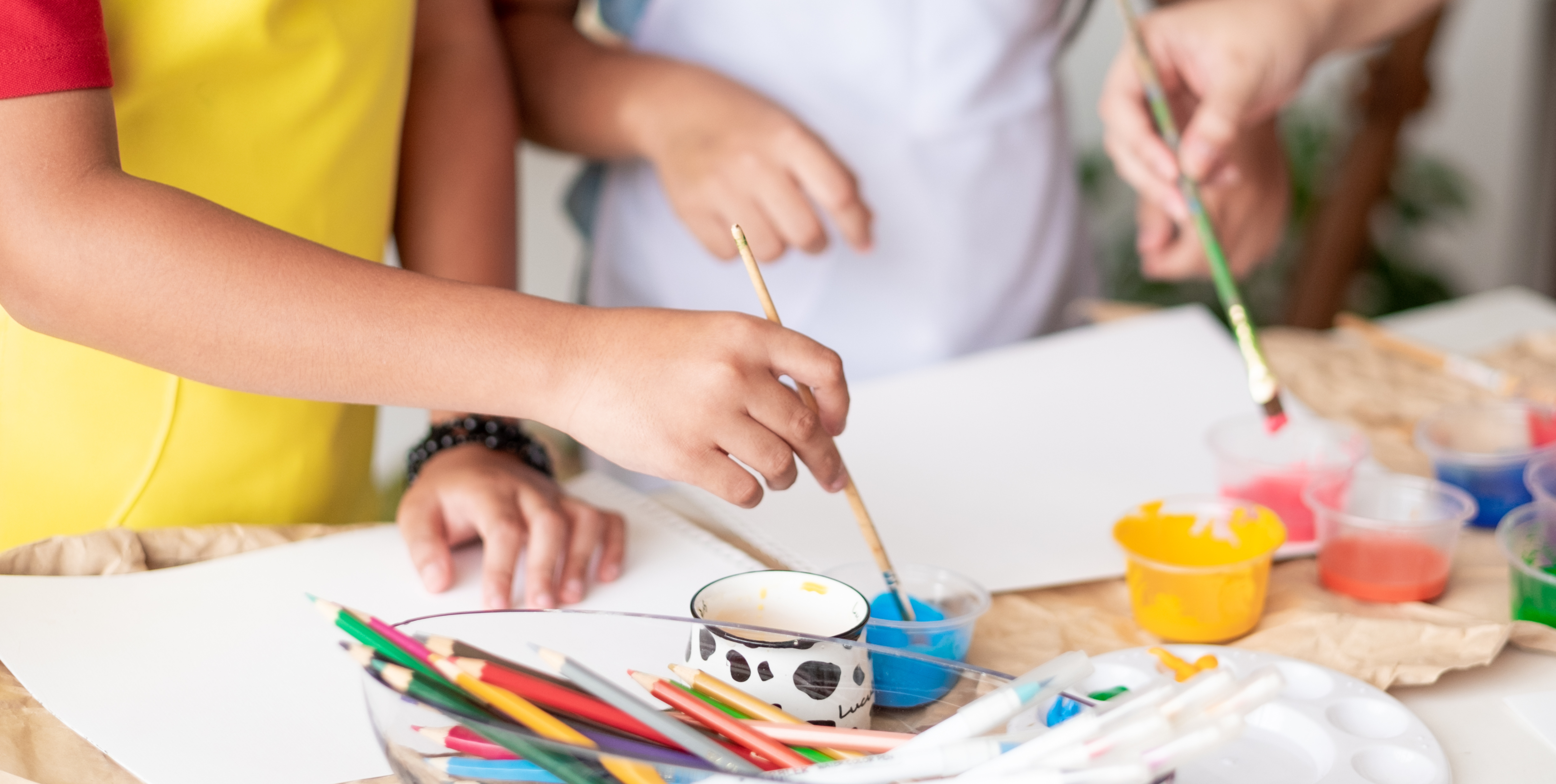 Kids painting with watercolors