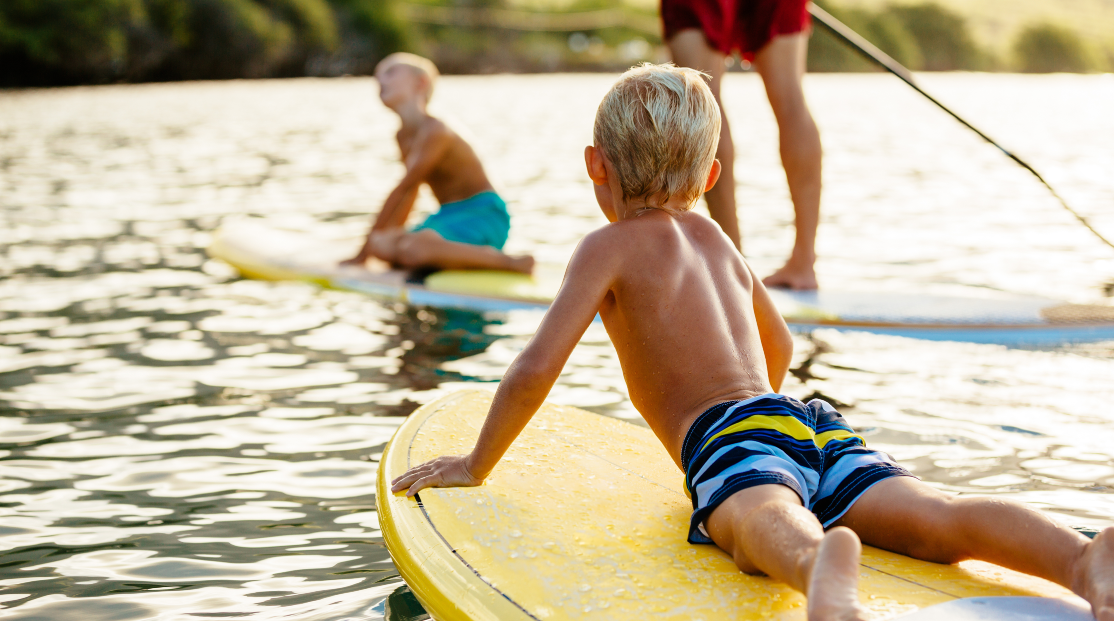 Family paddle boarding