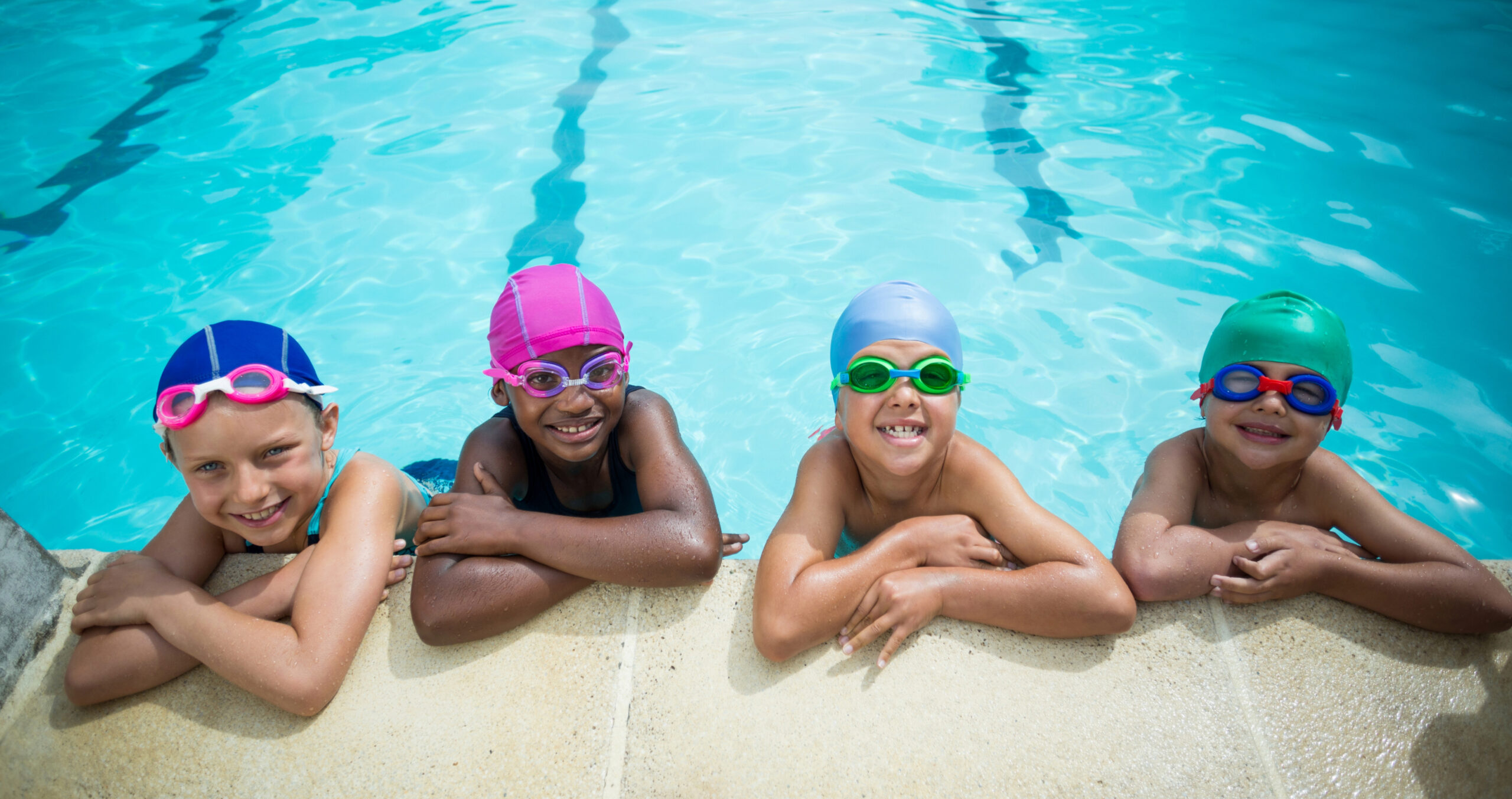 Kids taking swimming lessons
