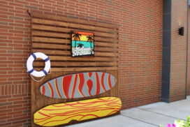 McEwen Northside Franklin TN Surfboard Art on brick wall.