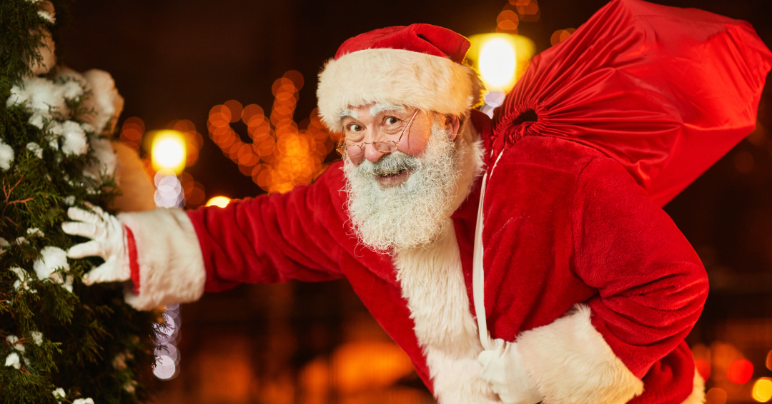 Santa with bag night parade