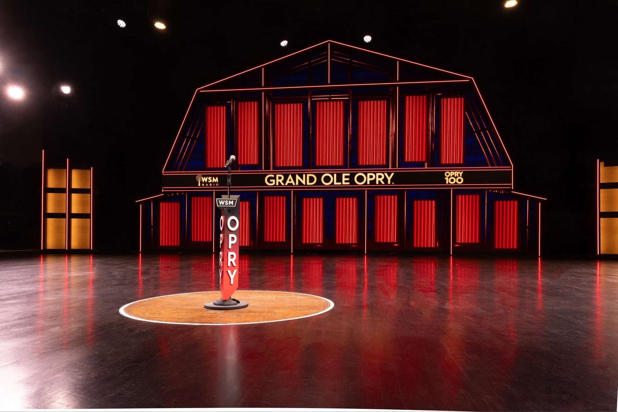 A lit up stage at The Grand Ole Opry House in Nashville, TN.