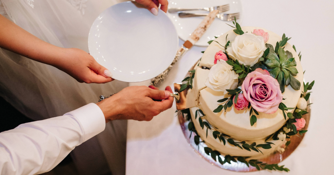 A newly married couple cuts their wedding cake, celebrating their marriage in Williamson County, Tennessee.