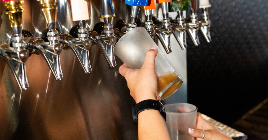 Filling up draft beer during happy hour at Jonathan's Grille in Franklin, Tennessee. 