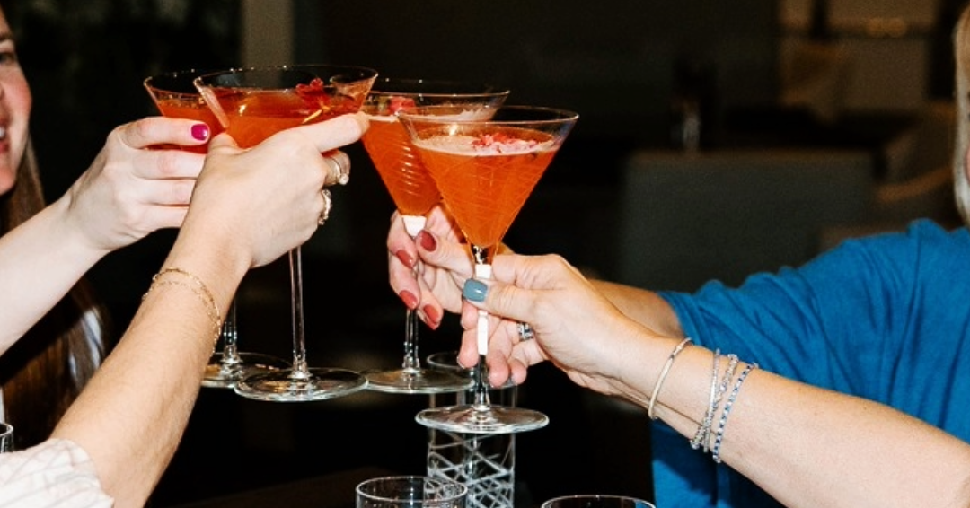 Toasting martinis to happy hour at The Rutledge, an American grill in Franklin, Tennessee. 