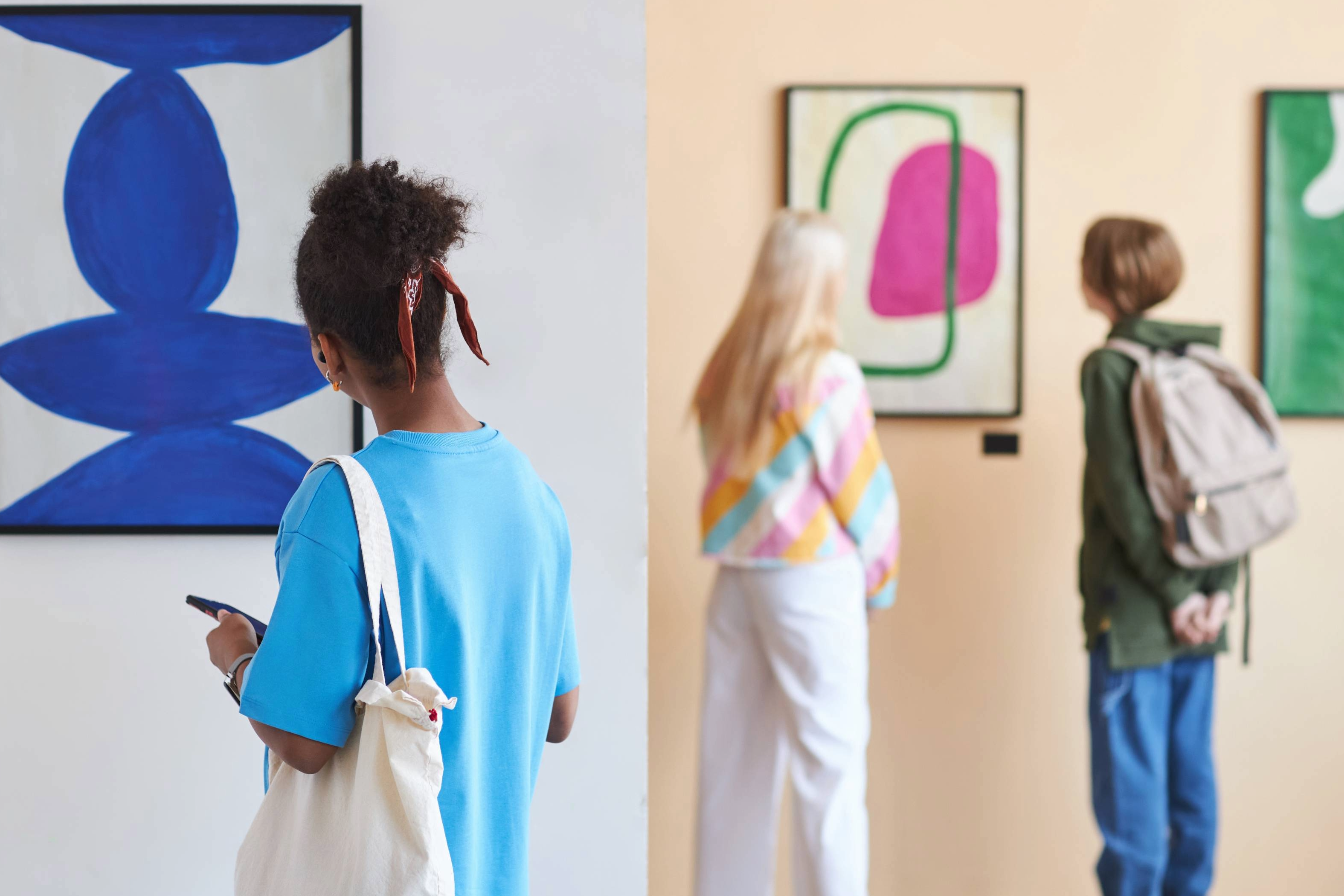Women admiring art in art galleries located in Williamson County, Tennessee.