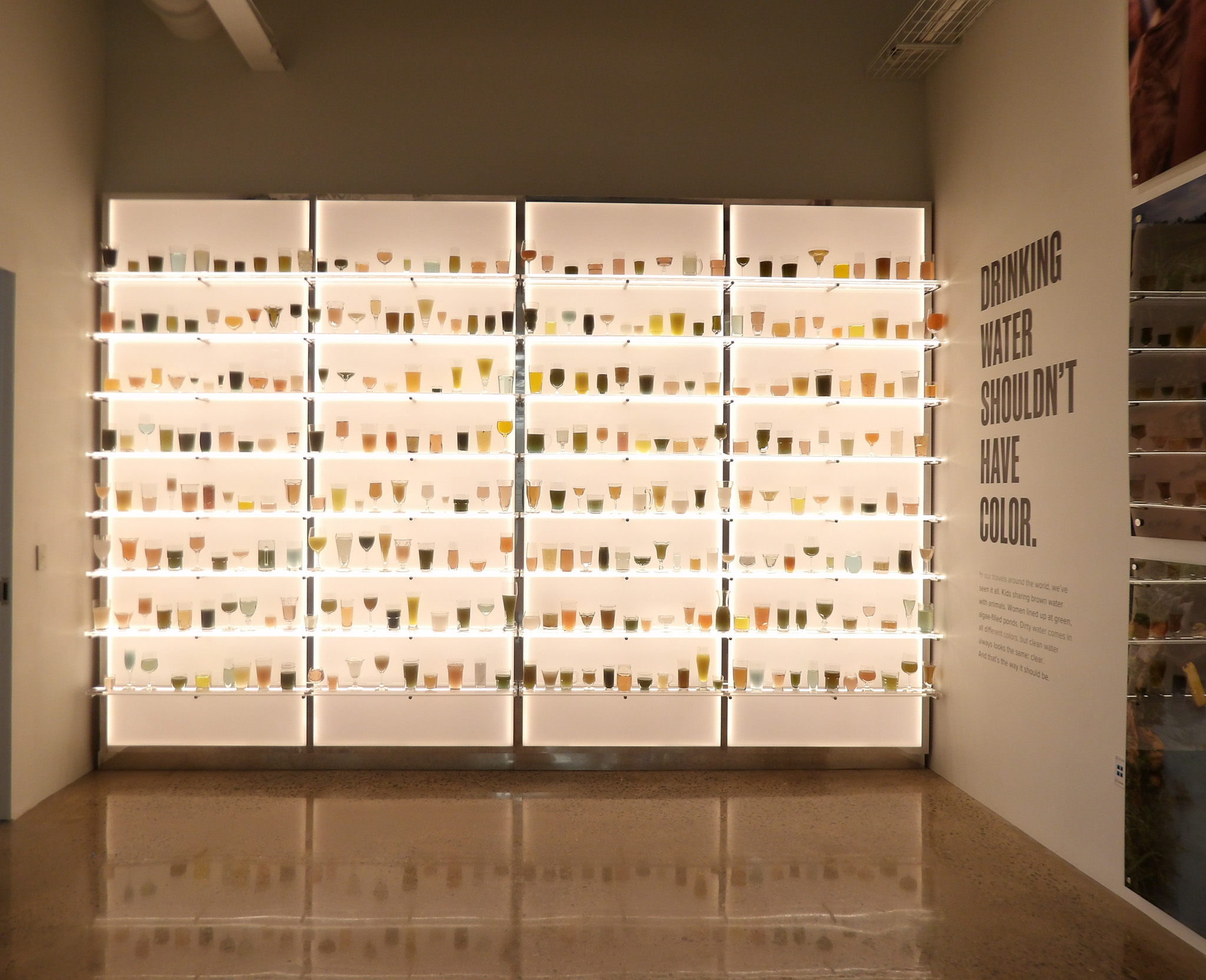 An art installation at The Experience Lab by charity: water in Franklin, TN., inside The Factory at Franklin, showcases the realities of water contamination around the world.