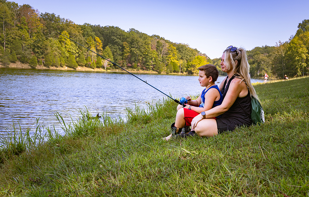 Montgomery Bell State Park Campout-3-All youth participants at the USA’s Family Campout received a fishing rod to keep, and volunteers were available to assist them in setting it up and baiting their hooks.
